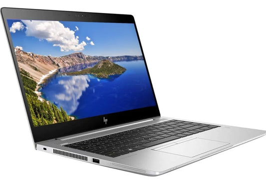 HP EliteBook 840 G5 laptop displaying a vibrant landscape on its screen, angled for a dynamic view by Hp.